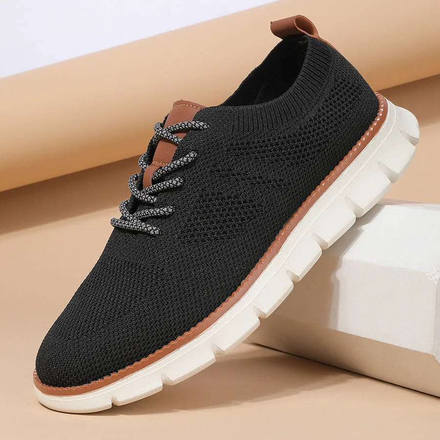 Men's grey and black fly woven mesh sneakers with round toe and low-heel design
