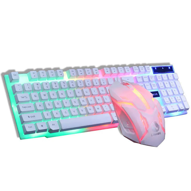 GTX300 black and white wired gaming keyboard and mouse set with backlit keys on a desk.