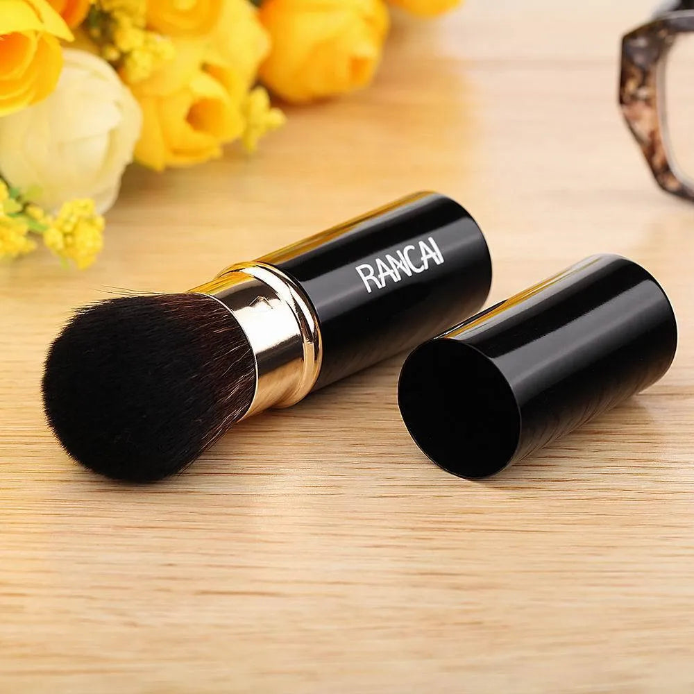 9cm retractable makeup brush with aluminium tube and fibre wool bristles, shown in black and red