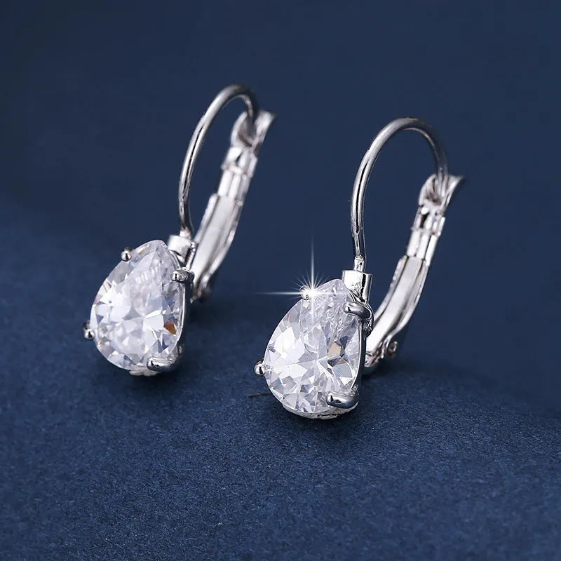 Drop-shaped copper earrings with platinum inlaid gem, gold or platinum plating, approximately 2.5 cm long