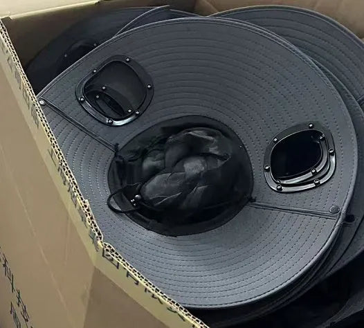 Grey solar-powered ventilation cap with large brim and built-in fan on the front.