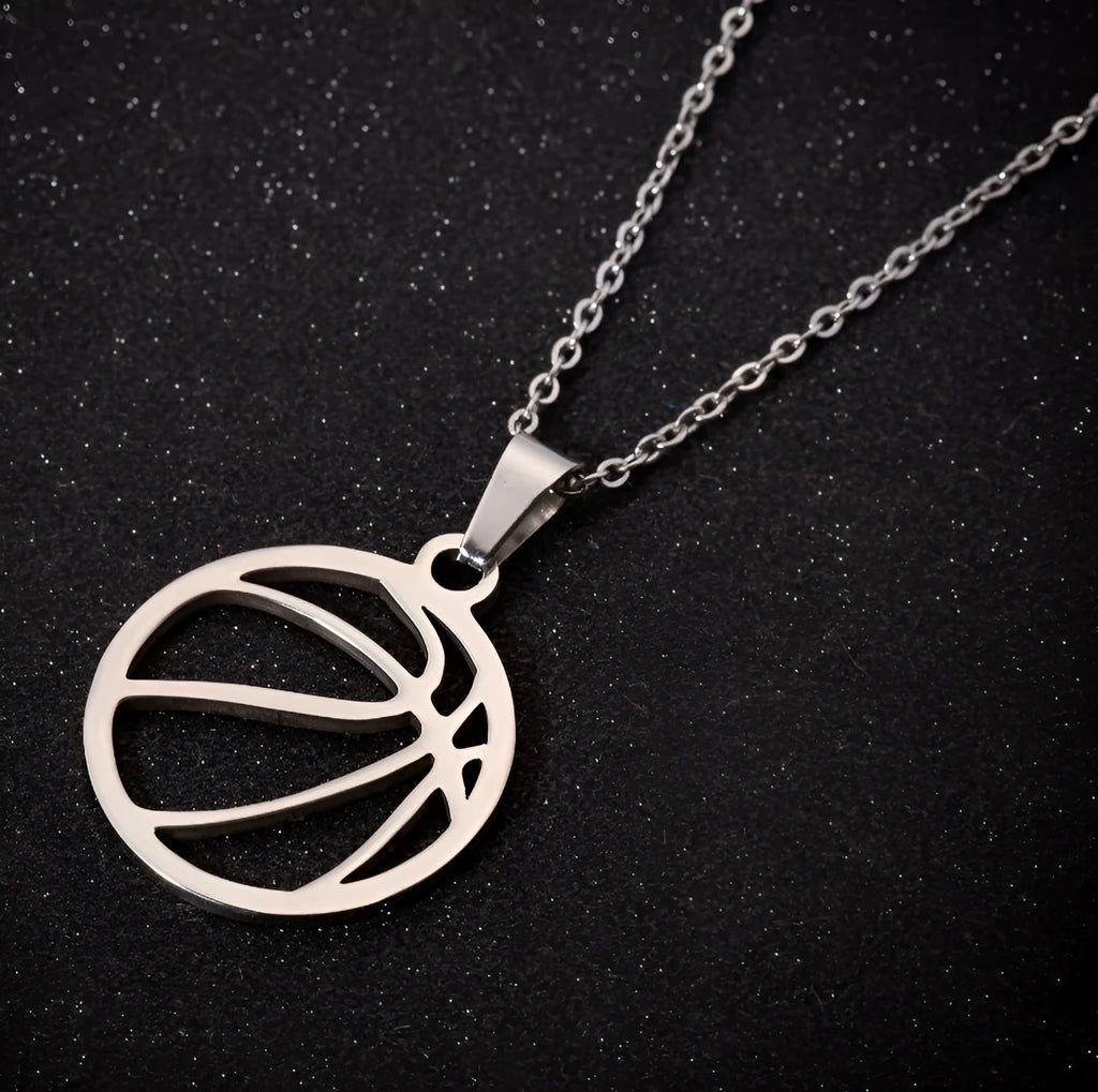 Stainless steel volleyball necklace with volleyball-shaped pendant, available in Gold or Silver colour options.