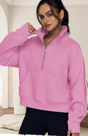 Women's loose fit lapel sweater with fleece lining and long raglan sleeves in a solid colour.