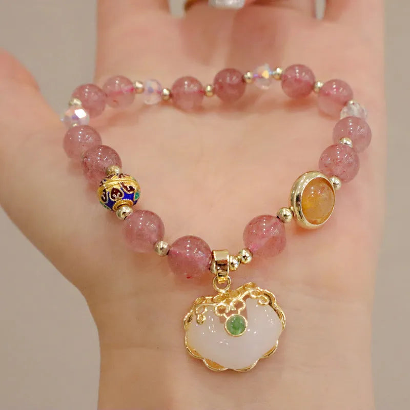 Women's ethnic bracelet with grey jade beads, strawberry quartz stones and geometric metal decorations