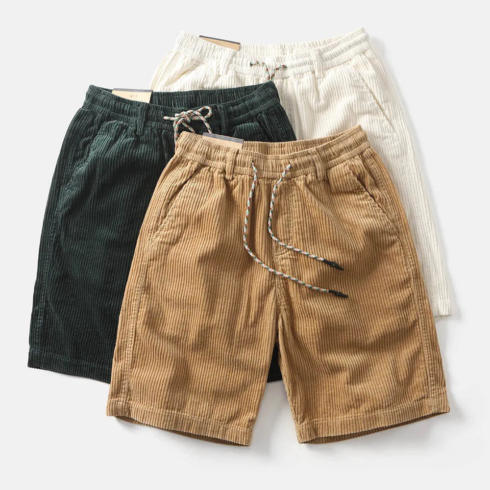 Men's khaki cargo shorts with multiple utility pockets, straight-leg design, and retro American-style detailing