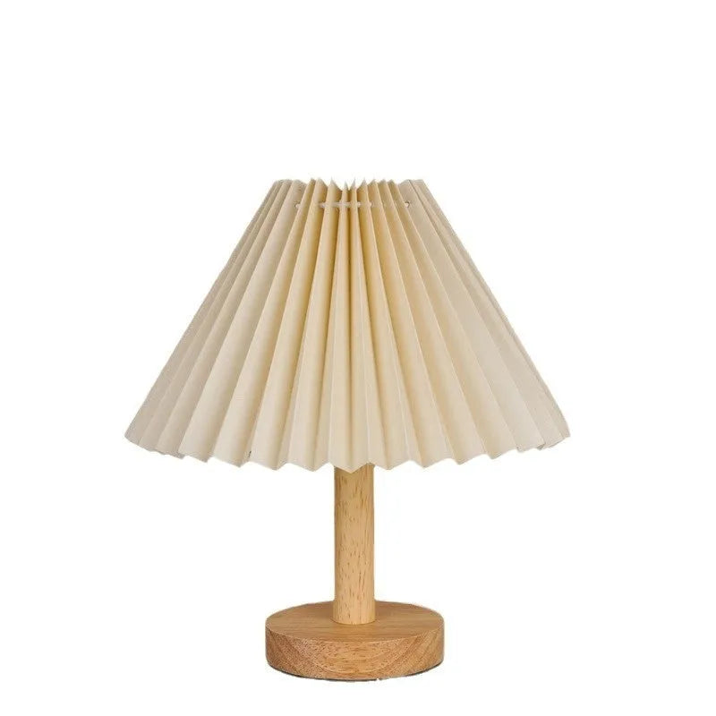 Vintage pleated umbrella-shaped bedside lamp with remote control on bedside table
