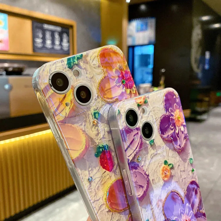 Purple and yellow soft rubber phone cases with oil painting flower designs and diamond accents