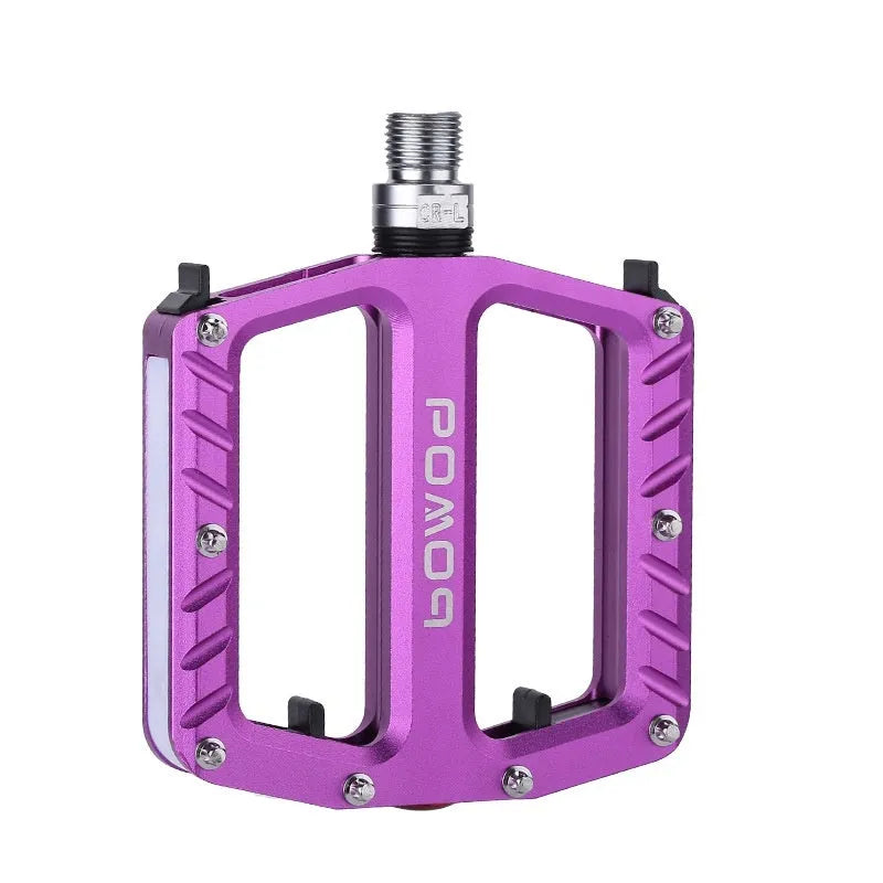 Pair of aluminium alloy bicycle pedals with integrated LED lights in multiple colour options