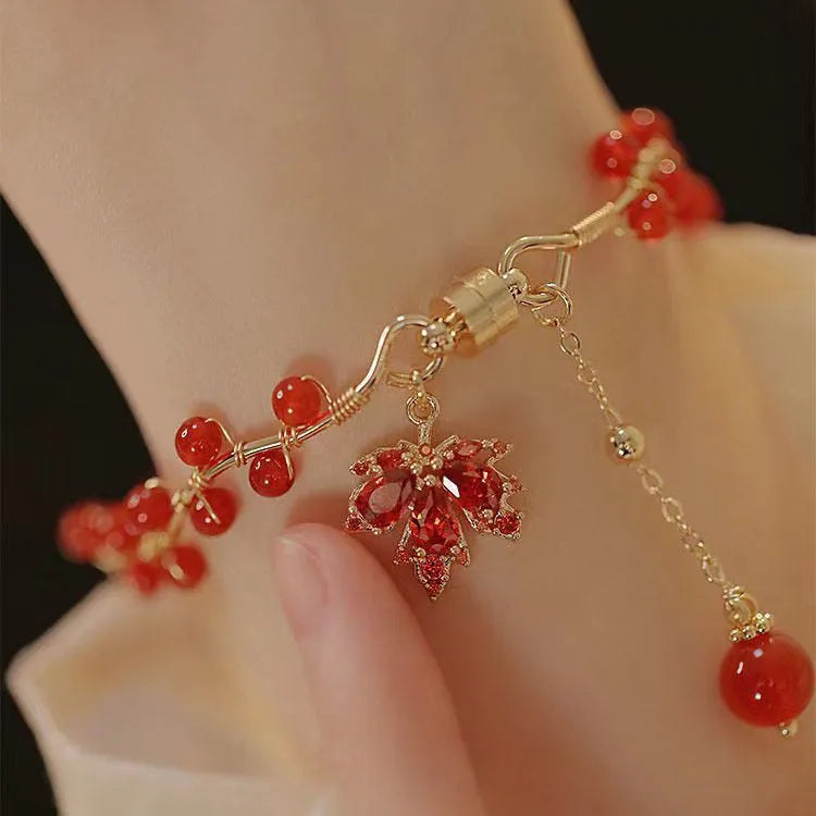 Red electroplated alloy bracelet with Chinese style maple leaf design and magnetic closure for girls