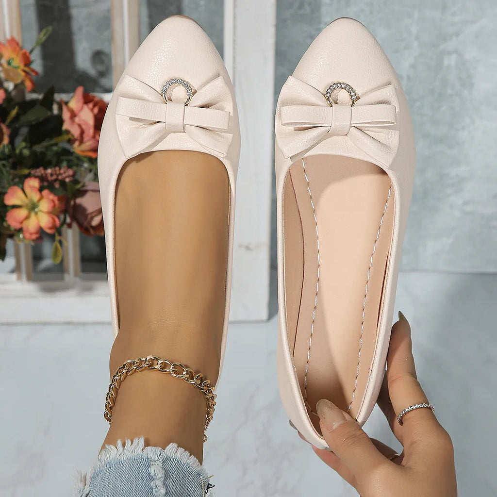 Women's flat casual shoes with bowknot detail and shallow mouth opening in beige colour