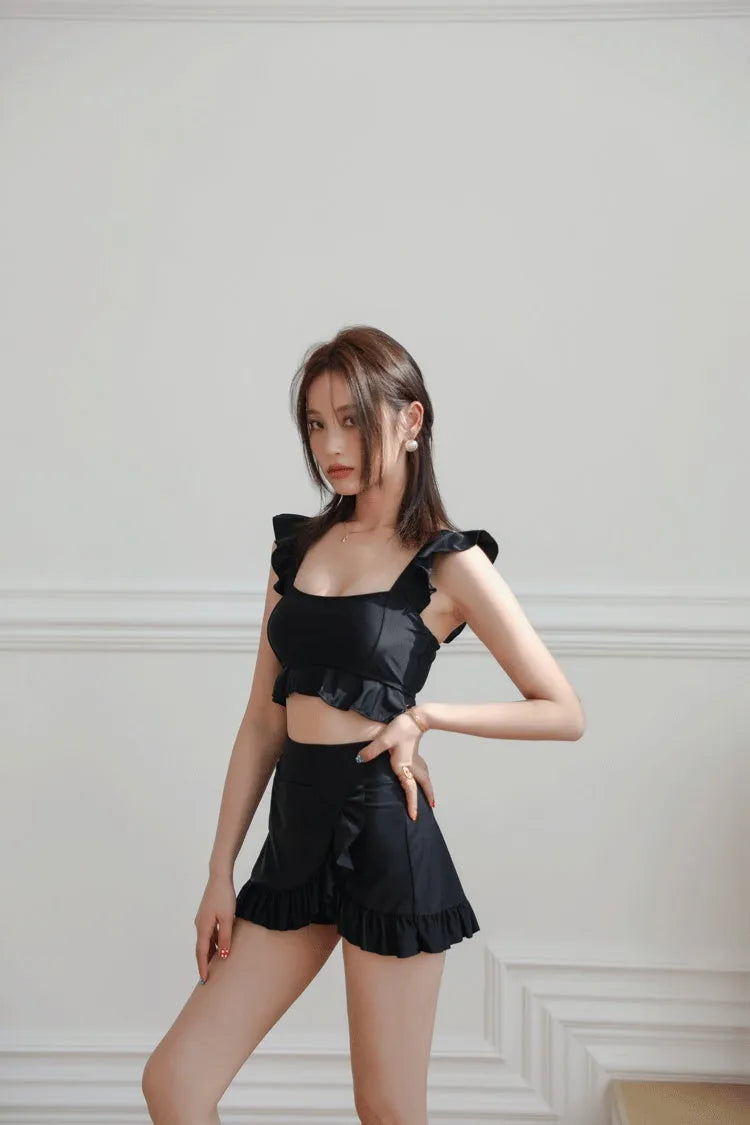 Black nylon swimsuit for women with split brief design