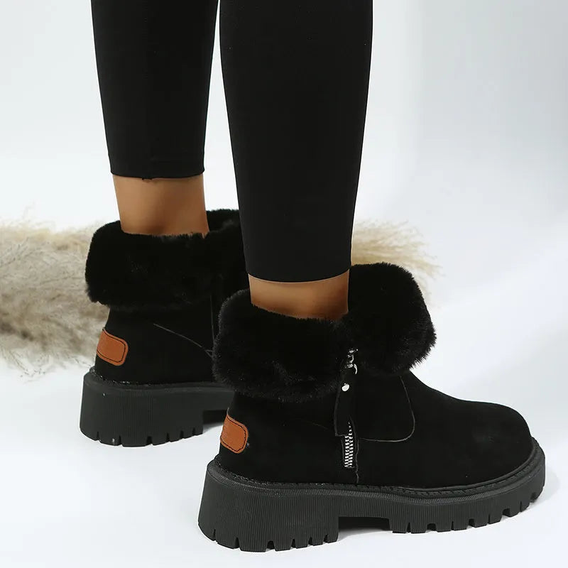 Women's black snow boots with high-top design, side zipper, and non-slip rubber sole for winter