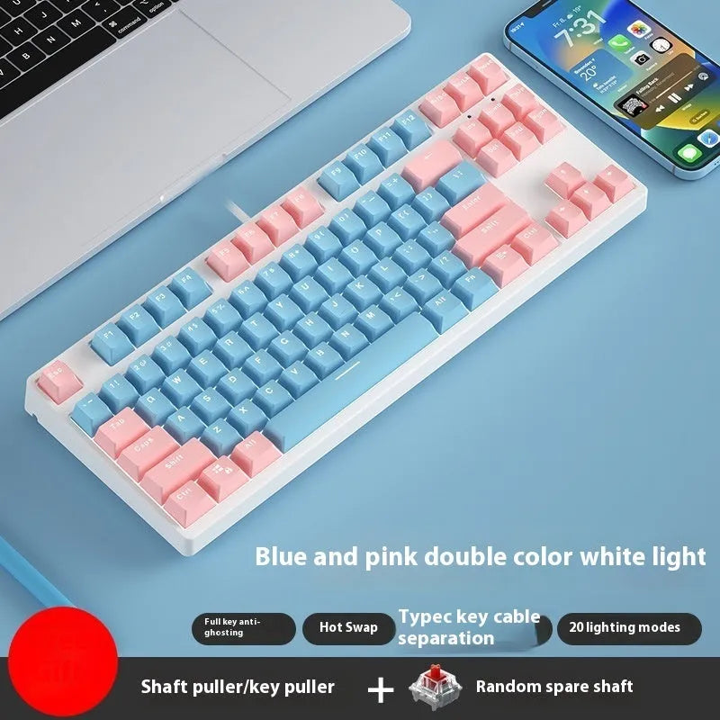 87-key wired mechanical keyboard with two-tone keycaps and metal frame, showing compact design and included tools