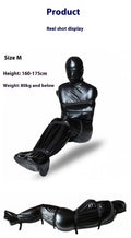 Black patent leather nostril clothing bondage set with six ratchet tie down straps