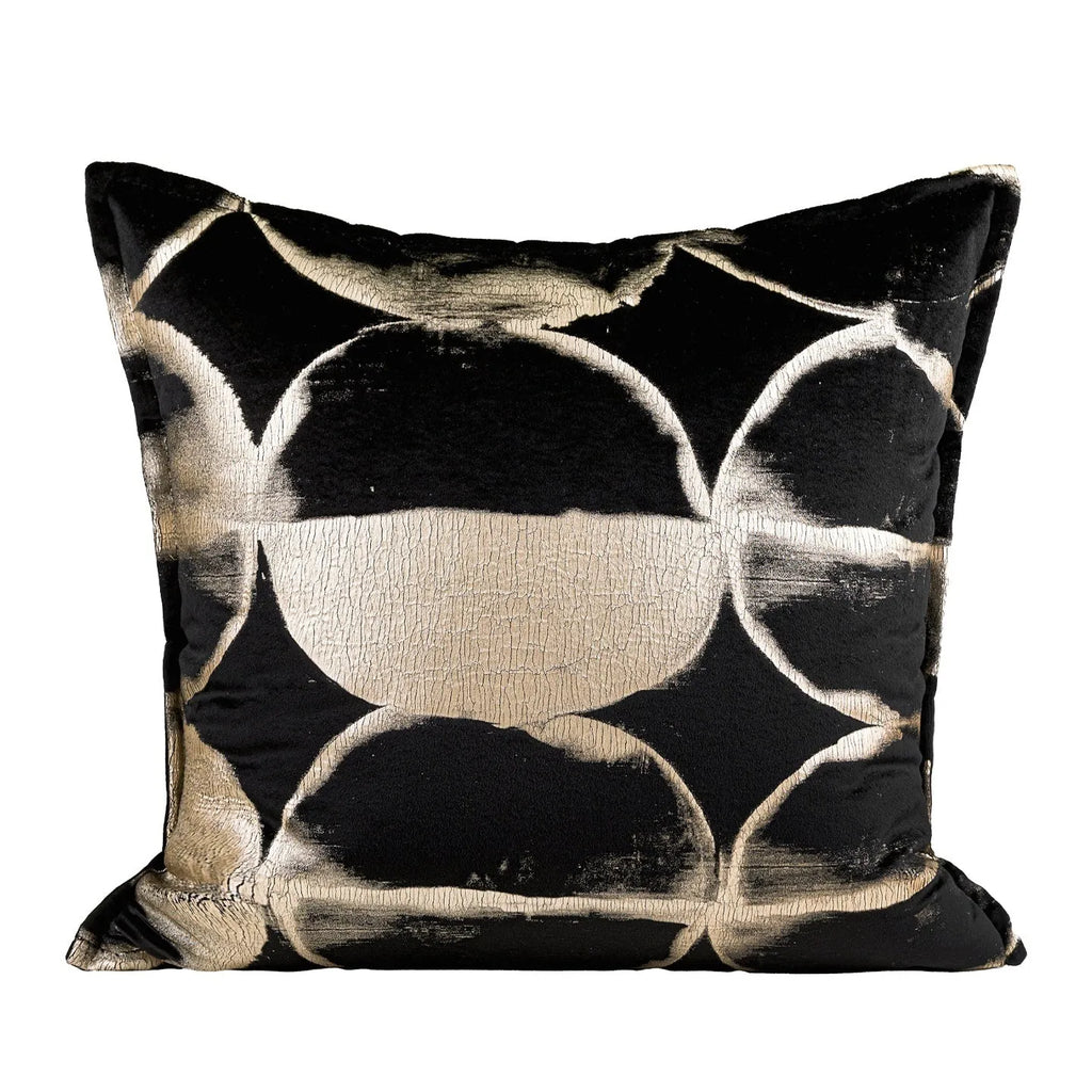 Black gold abstract pattern cushion with removable cover in three size options on furniture