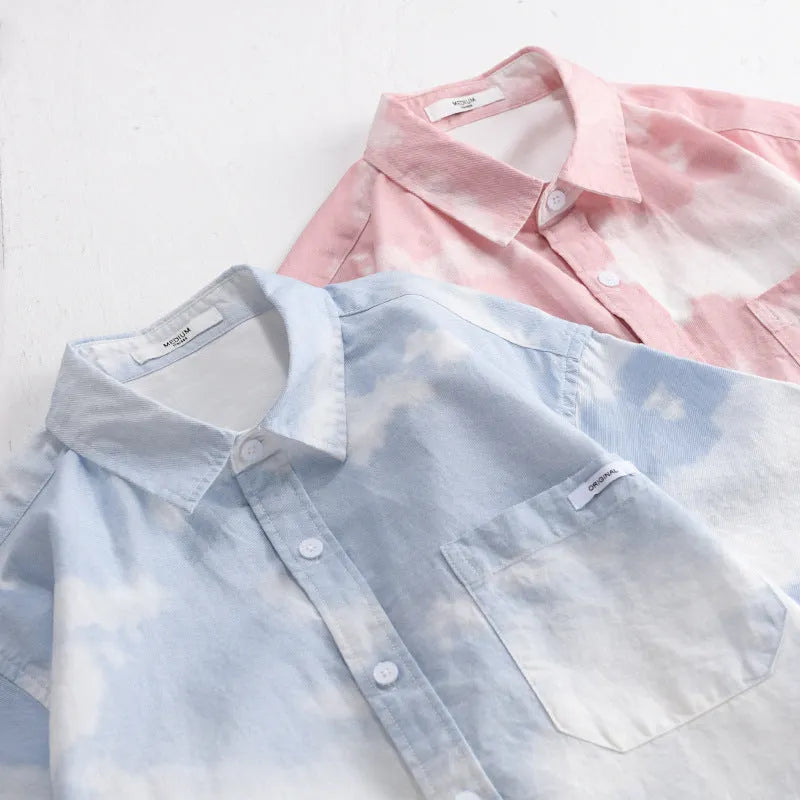 Man wearing a light pink loose-fit pure cotton short sleeve casual shirt for summer.