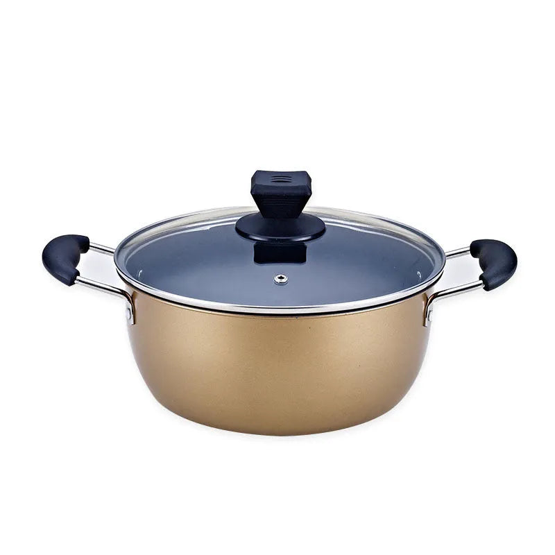 Cast iron three-piece cookware set with soup pot, milk pot, and wok on a kitchen counter