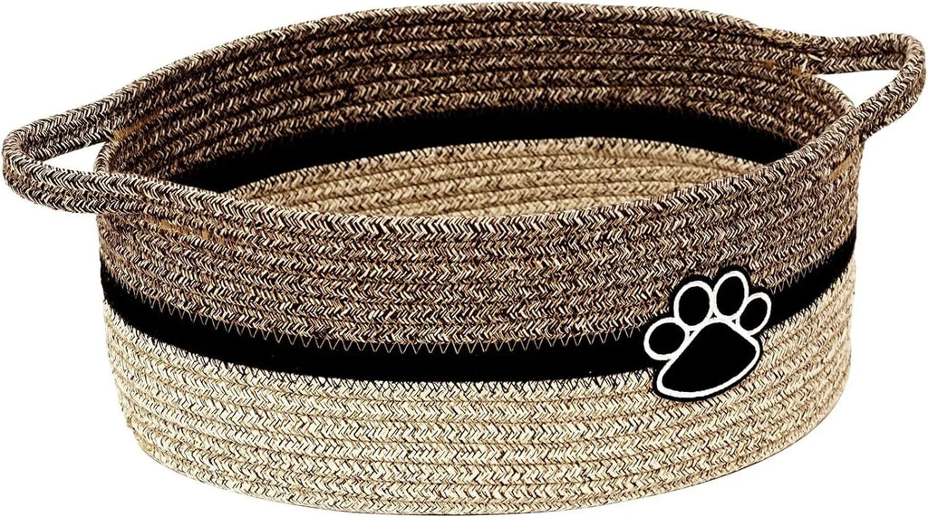 Small woven cotton rope storage basket with wooden handle in light beige, measuring 34x26x15cm, on a shelf with toys