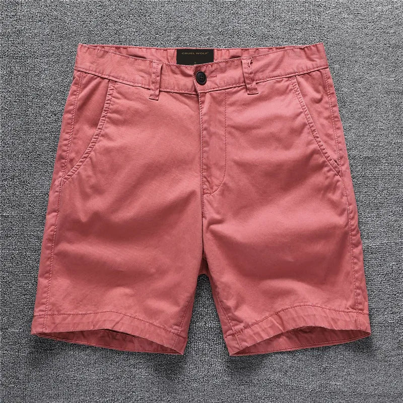 Cotton workwear shorts in camouflage pattern with mid-waist and zip fly design