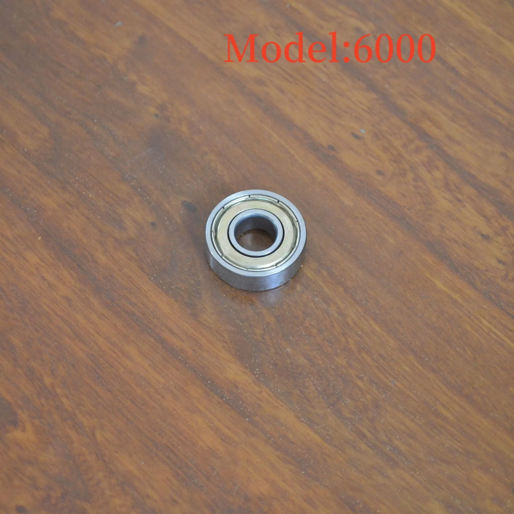 6000zz carbon steel radial ball bearing with 10mm bore, 26mm outer diameter, and steel retainer.