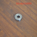 6000zz carbon steel radial ball bearing with 10mm bore, 26mm outer diameter, and steel retainer.