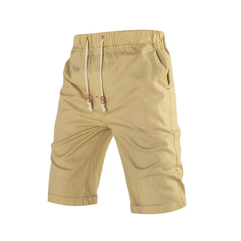 Men's solid colour cotton blend sports shorts with drawstring waist and zipper pocket.