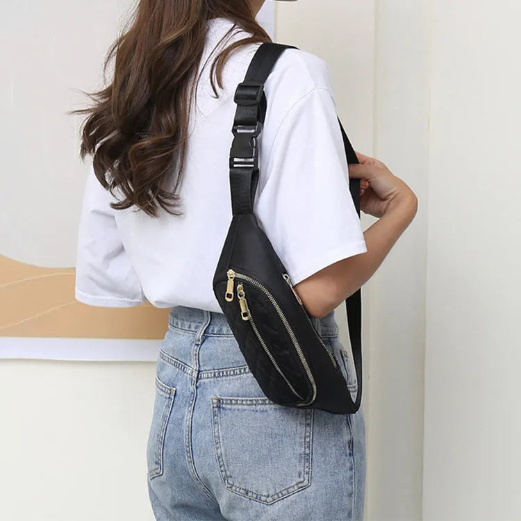 Rhombus nylon fanny pack for women in solid colour with zipper pockets and single soft handle for crossbody or waist wear.