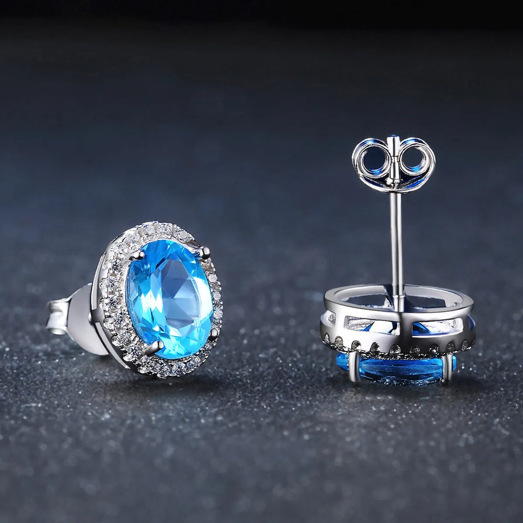 925 sterling silver blue topaz jewellery set with geometry design including earrings, ring, pendant, and necklace