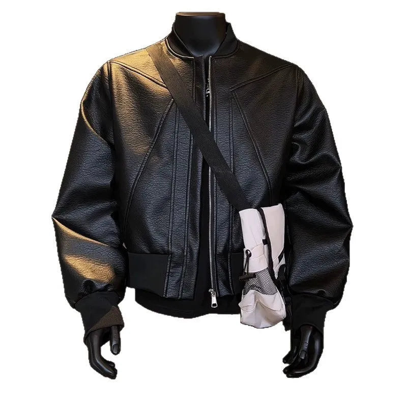 Man wearing a black PU leather jacket with litchi grain texture, showcasing its 100cm extended length and light business style fit.