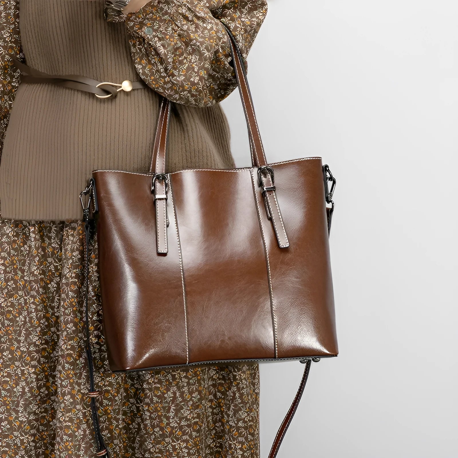 Brown genuine leather women's retro shoulder bag with three strap options and organised interior compartments