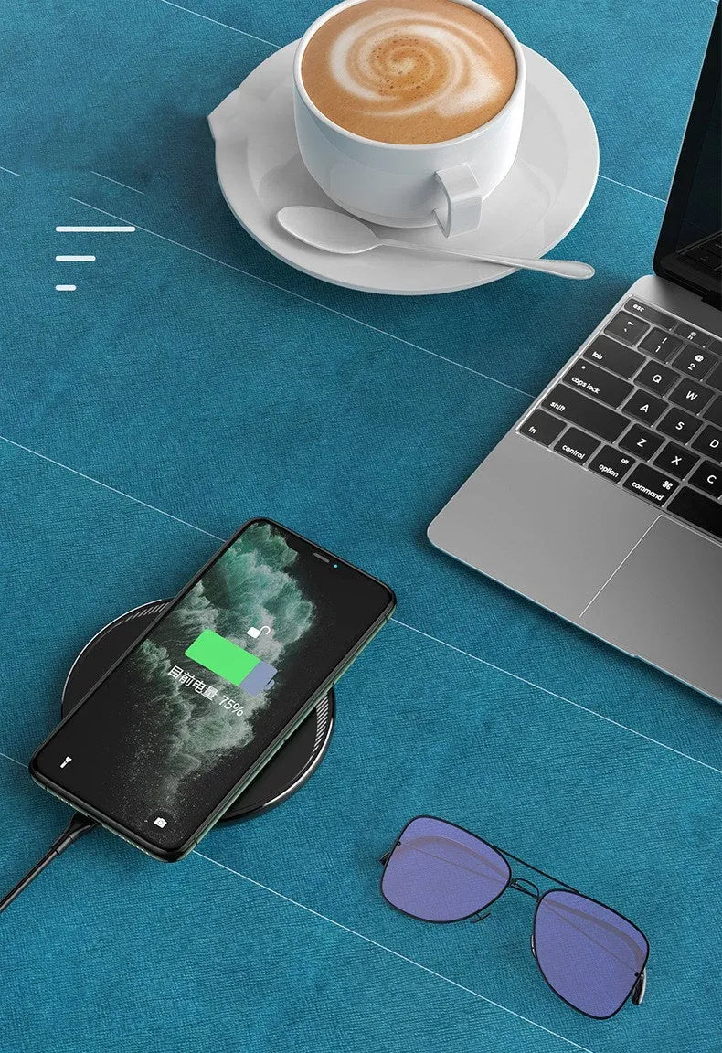 Black Kuulaa wireless charging disc for mobile phones with LED indicator and Micro USB port