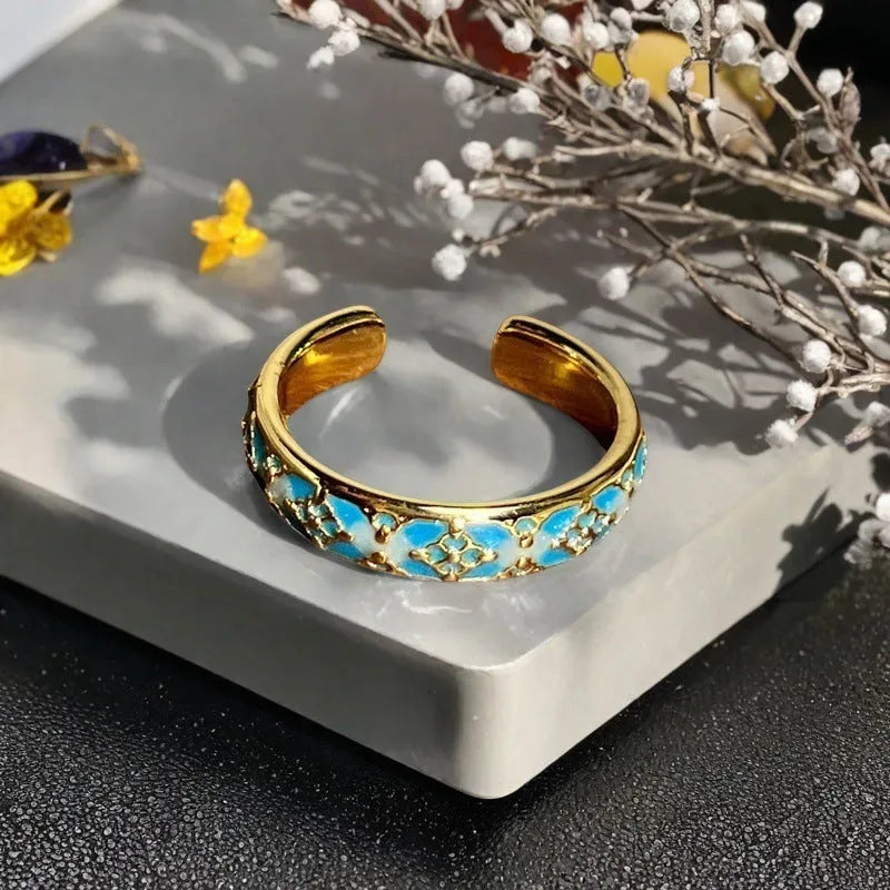 Adjustable copper ring with vintage oil-dripping gourd design, inlaid zircon stones, and flower and bow shapes in New Chinese style