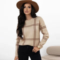 Women's plaid colour-block crew neck sweater showing apricot, black, beige, red, and green stripe options