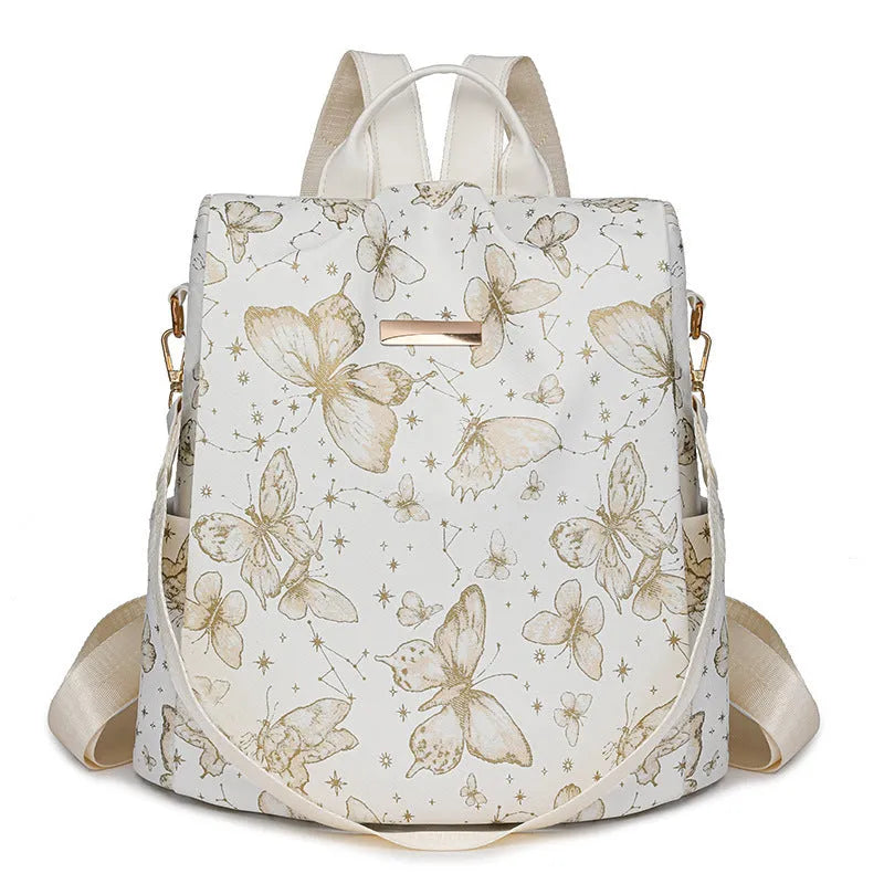 Butterfly printed black PU leather backpack with visible sewing lines and a physiological curve backplate.