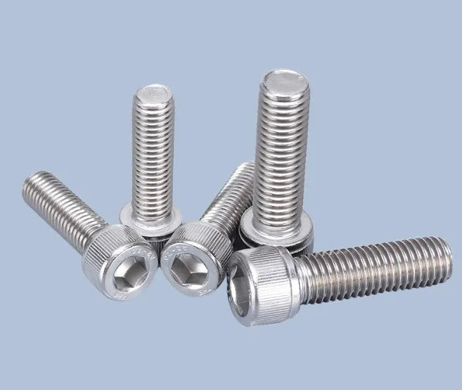 Stainless steel phono cartridge mounting kit with allen bolts, nuts, washers, and two allen keys on a white background.