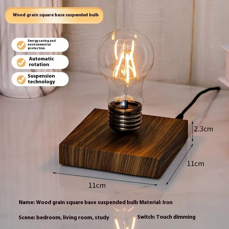 Suspension bulb small night lamp with 11cm square base and iron art body on wooden desk