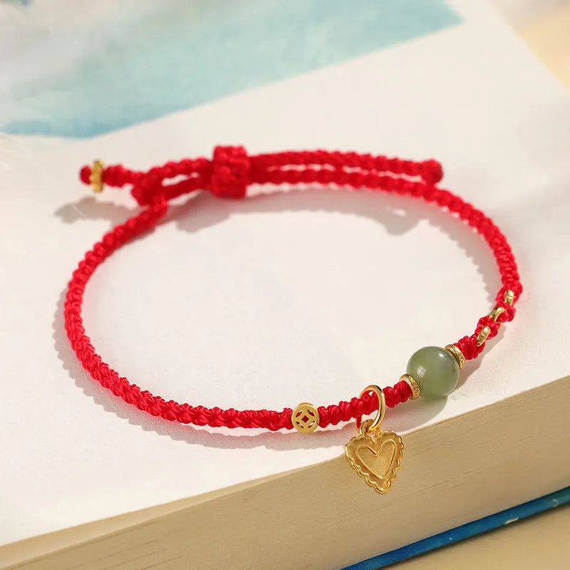 Handmade 925 silver and Hetian jade woven bracelet with red strap