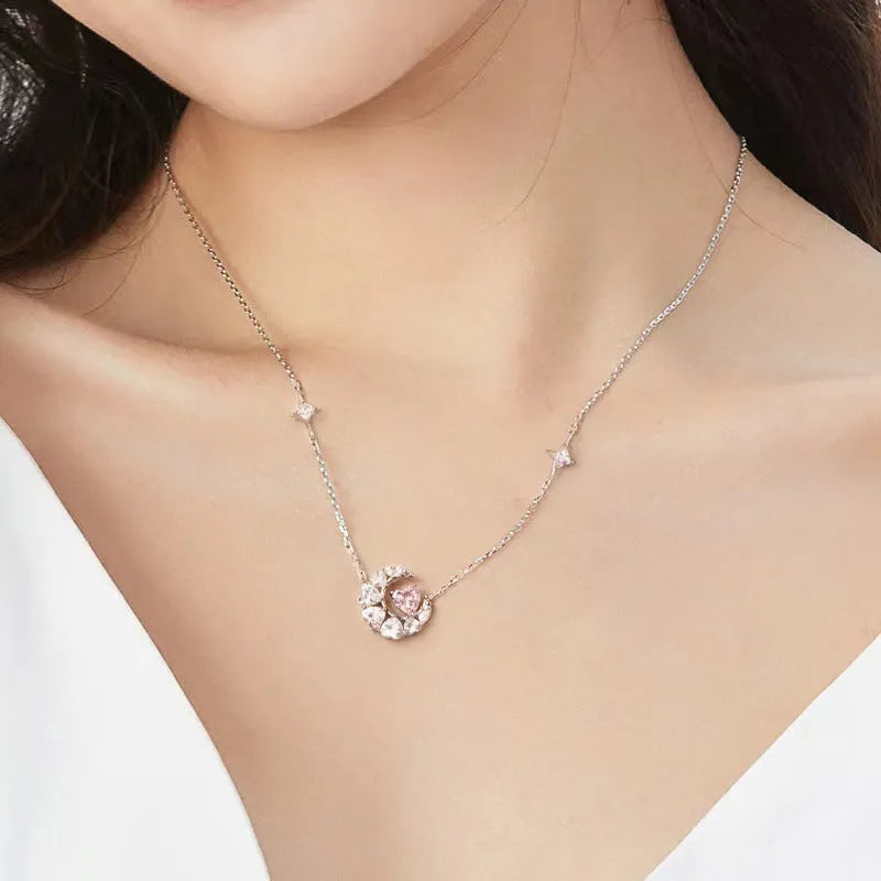 Stars and moon copper necklace with heart-shaped pendant on cross chain, pink or white diamond colour