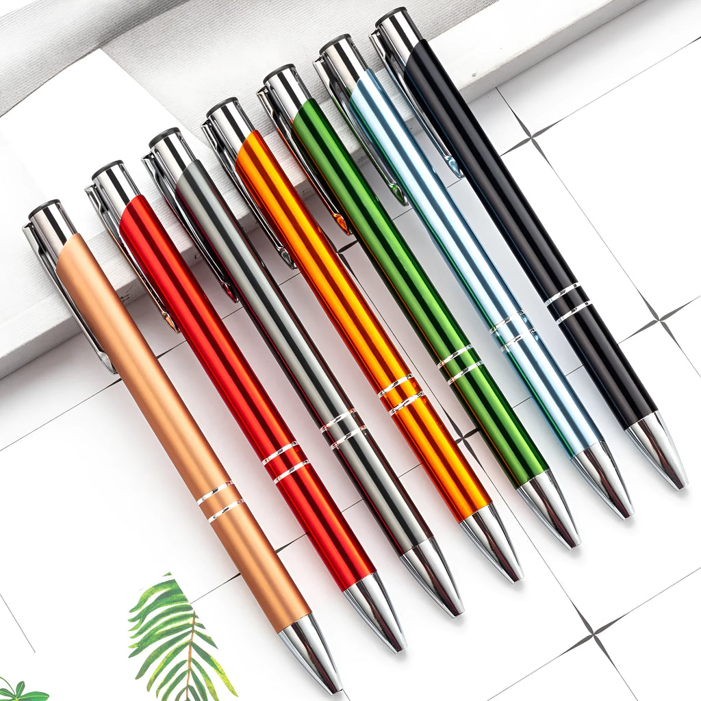 Metal ballpoint pen with push-action mechanism in various colours including black, blue, and champagne gold