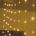 Copper curtain lamp with 100 LED beads emitting warm white light, suitable for outdoor decoration with USB cable