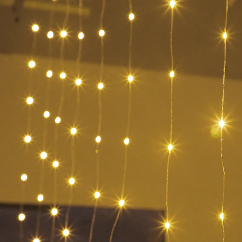 Copper curtain lamp with 100 LED beads emitting warm white light, suitable for outdoor decoration with USB cable