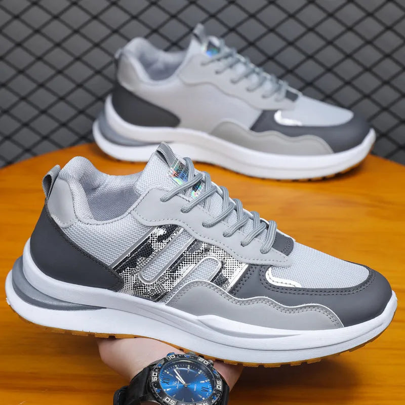 Men's white green mesh sports casual shoes with a leather toe holder on a plain background.