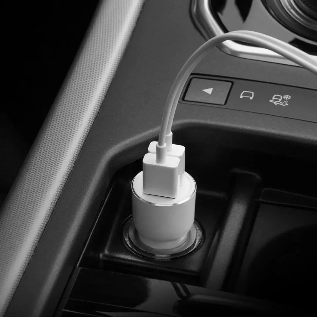 Black Ruimi 3S Bluetooth car charger with USB port for charging phones and tablets.