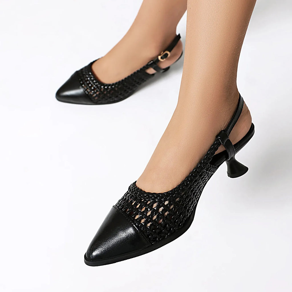 Gold women's cat heel sandals with pointed toe and buckle strap on a rubber sole.