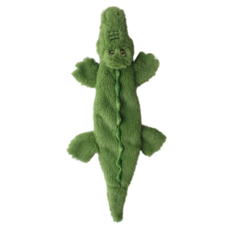 Green crocodile-shaped plush dog toy with no stuffing, measuring 20cm long with squeaker in head and crinkle paper in tail