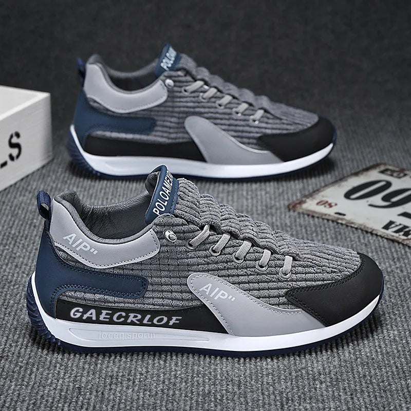 Men's grey and green mesh running shoes with low-top design and round toe