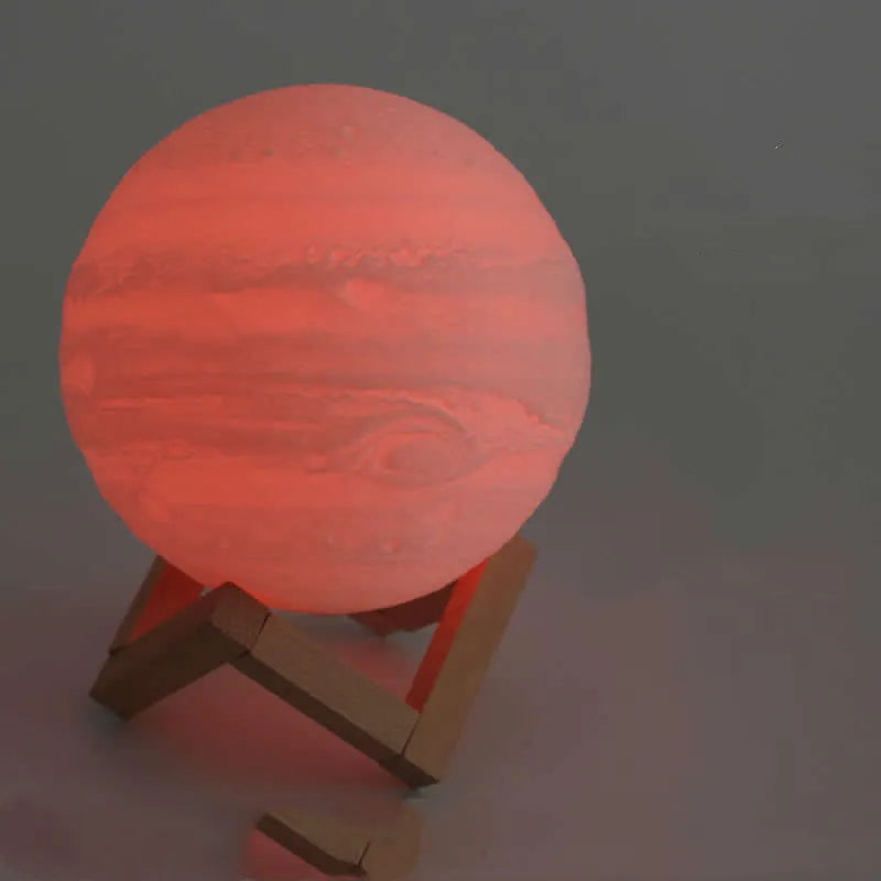 3D printed spherical moon lamp with visible surface contours and touch-sensitive metal ring at base