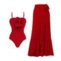 Red women's V-neck one-piece swimsuit with floral design and a detachable long skirt.