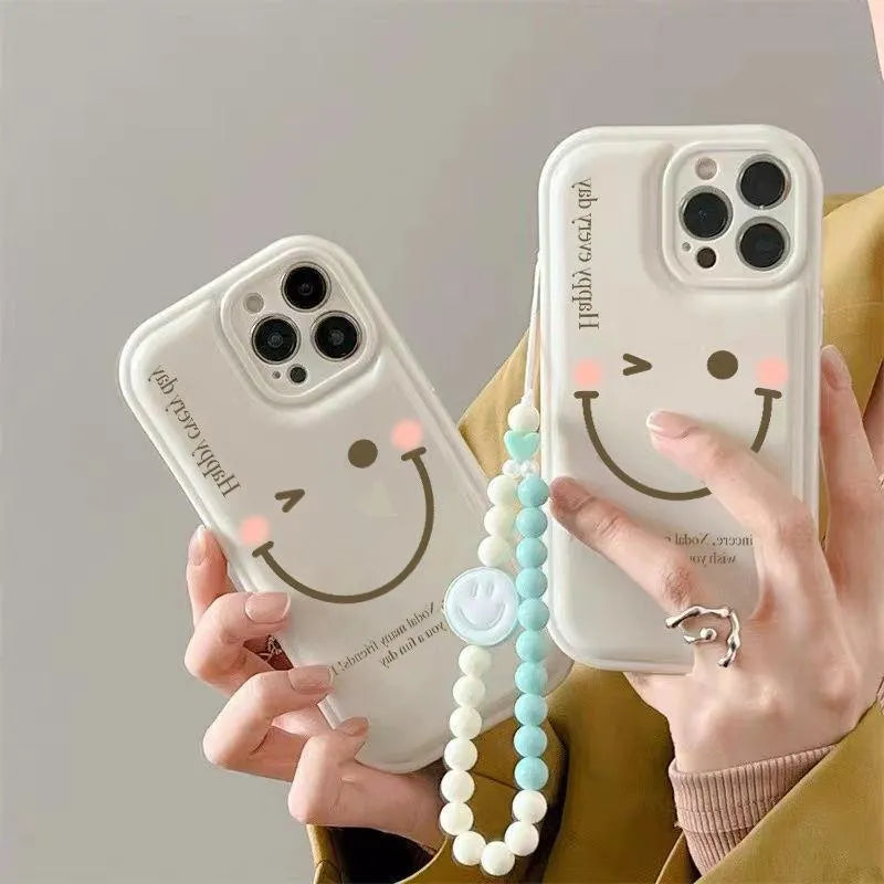 Mint green TPU iPhone case with decorative metal chain attached, shown next to standard version without chain.
