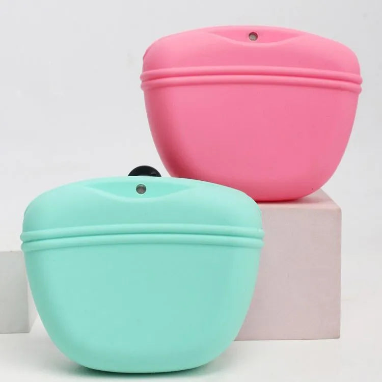Silicone dog treat bag with magnetic closure measuring 12.5cm long, shown attached to belt with treats visible inside